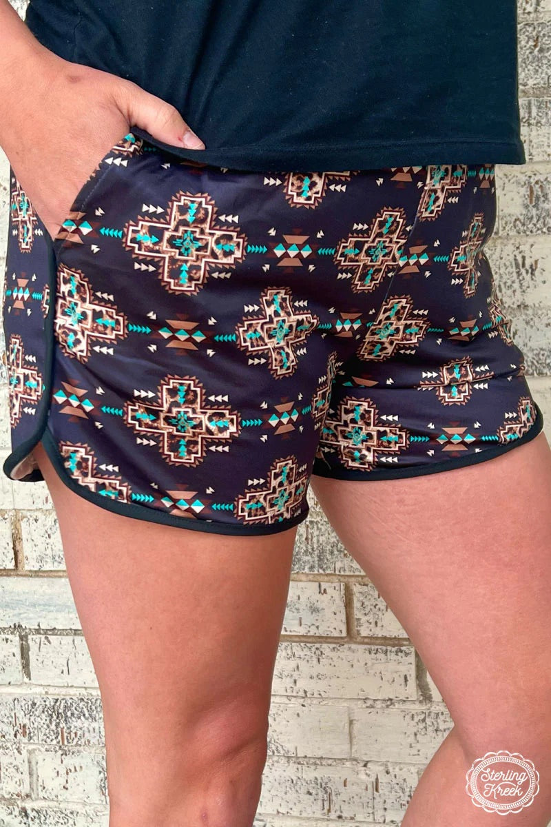 Bring some wild style to your wardrobe with our PLUS UNBELIEVABLE SHORTS! These bad boys feature a black aztec with leopard print with pockets and a adjustable string in the waistband, so you can be stylish and roarin' in no time. Show 'em who's boss!  80% POLYESTER  20% SPANDEX