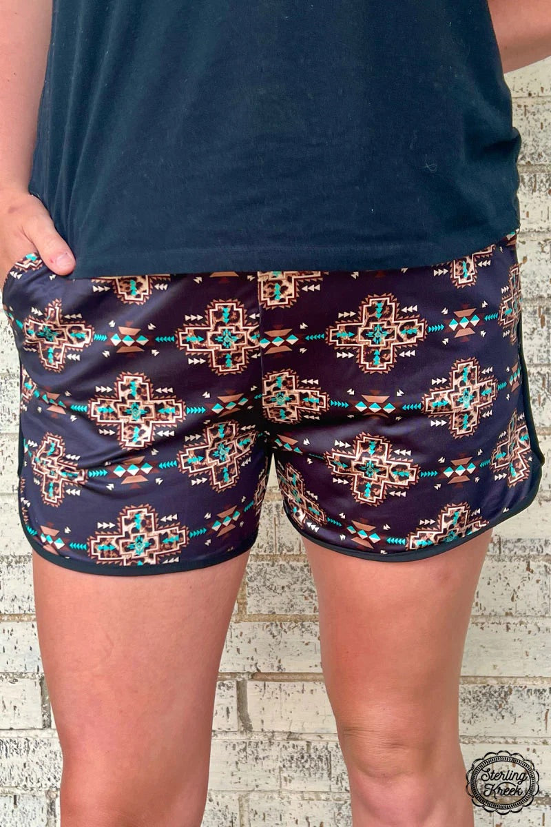 Bring some wild style to your wardrobe with our PLUS UNBELIEVABLE SHORTS! These bad boys feature a black aztec with leopard print with pockets and a adjustable string in the waistband, so you can be stylish and roarin' in no time. Show 'em who's boss!  80% POLYESTER  20% SPANDEX