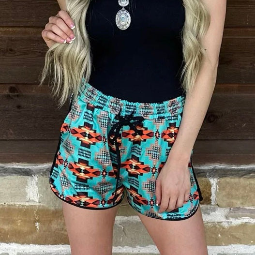 Make a statement with these Oklahoma City Shorts! These turquoise stunners feature an aztec design and pockets for all the important stuff. Comfort meets style - spice up your wardrobe today!  80% POLYESTER  20% SPANDEX