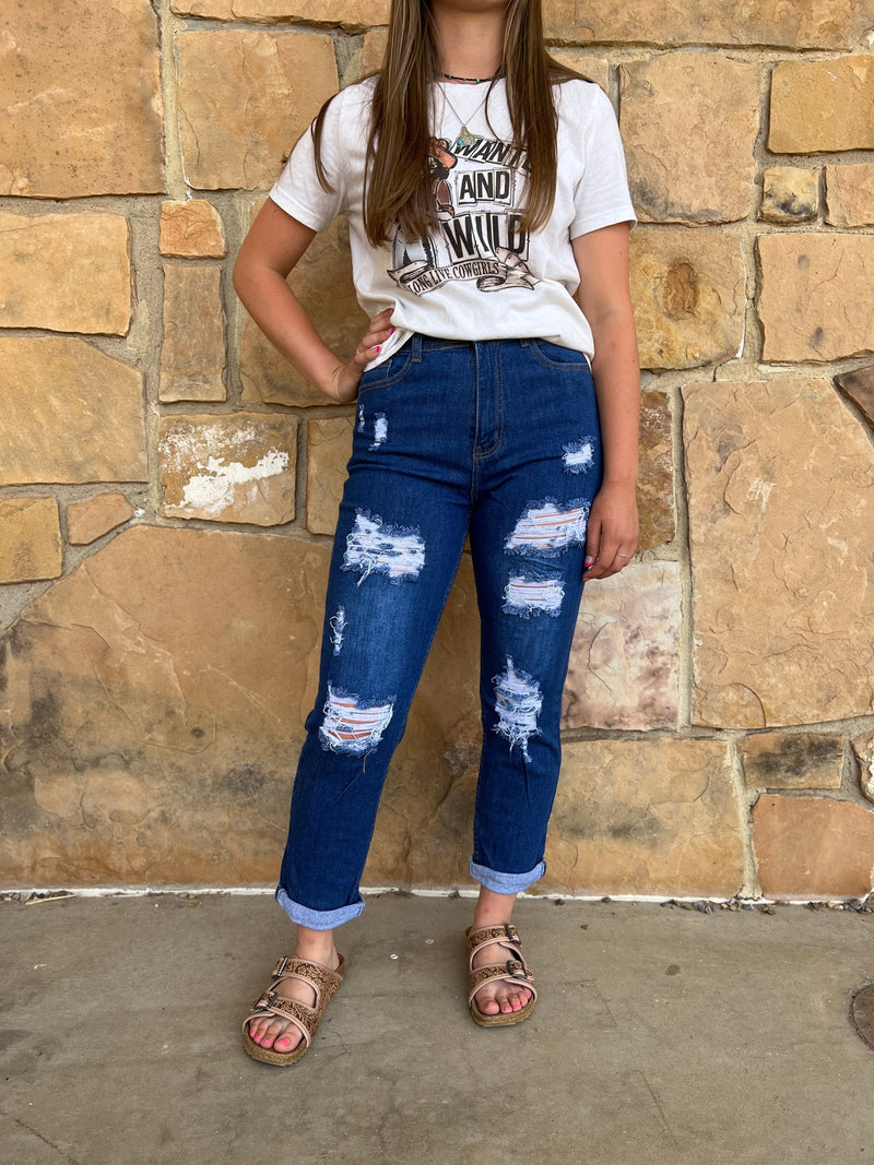 Make a statement in our Everyday Everywhere Denim! These high-waisted mom jeans elevate your look with shredded kneeholes, a distressed hem, and 5 pocket styling. Plus an unbeatable blend of 92% cotton, 6% polyester, and 2% spandex for the perfect fit and comfort you can wear for any occasion! 