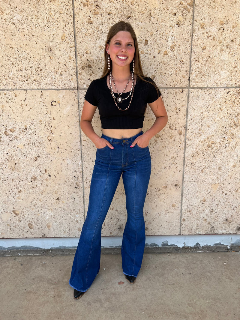Retro vibes all around! These Dance Floor Bell Bottoms will have you stepping back in time with their out inseam, stretch fabric, high rise, button zip fly and five pocket style. Rock your way through the night with the flare seam and 70% Cotton, 25% Polyester, 3% Rayon, 2% Spandex blend that's comfy and stylish. 
