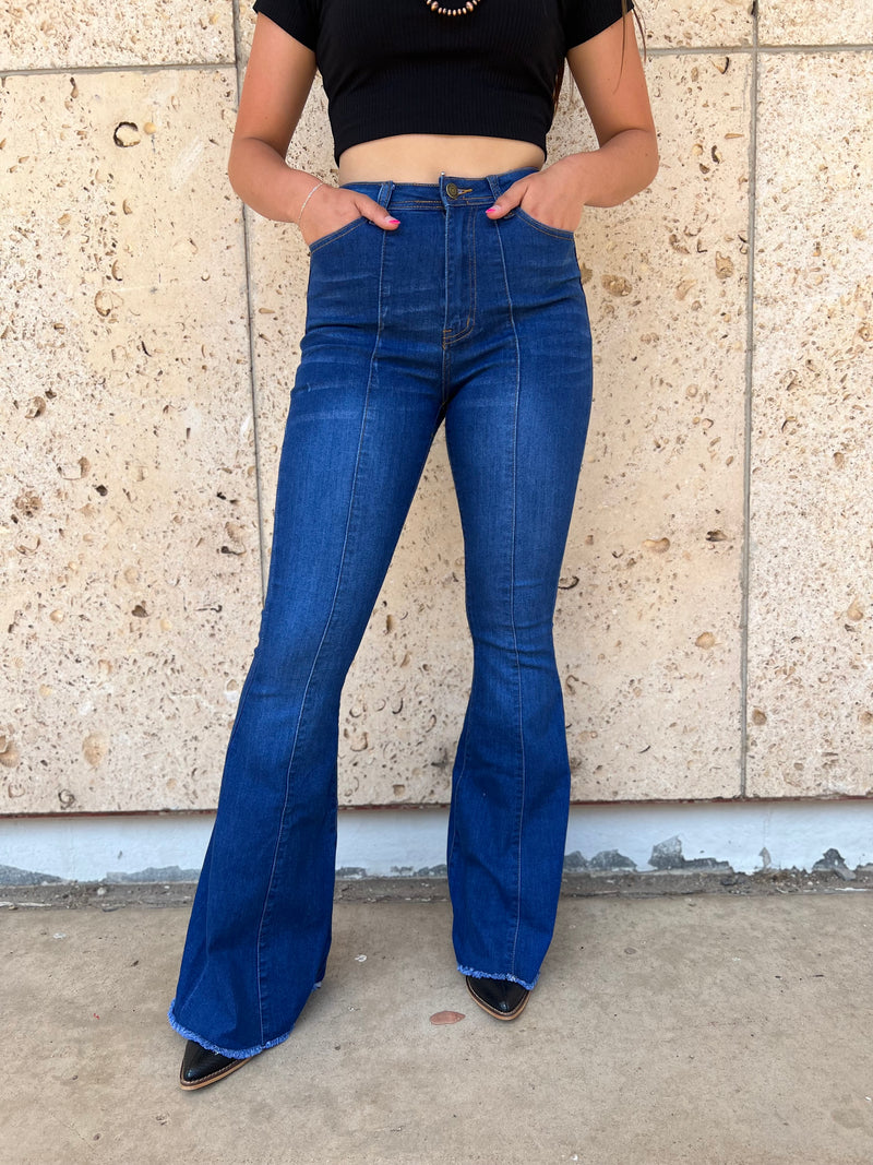 Retro vibes all around! These Dance Floor Bell Bottoms will have you stepping back in time with their out inseam, stretch fabric, high rise, button zip fly and five pocket style. Rock your way through the night with the flare seam and 70% Cotton, 25% Polyester, 3% Rayon, 2% Spandex blend that's comfy and stylish. 