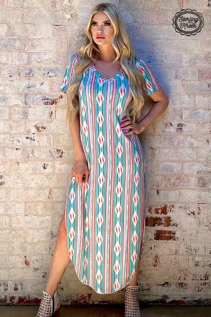Feel like "Mamma Mia!" in this PLUS v-neck maxi dress! This faded beauty features a stylish serape/aztec print that'll have you singing "Dancing Queen" all night long. Get ready to turn heads with this showstopper!
