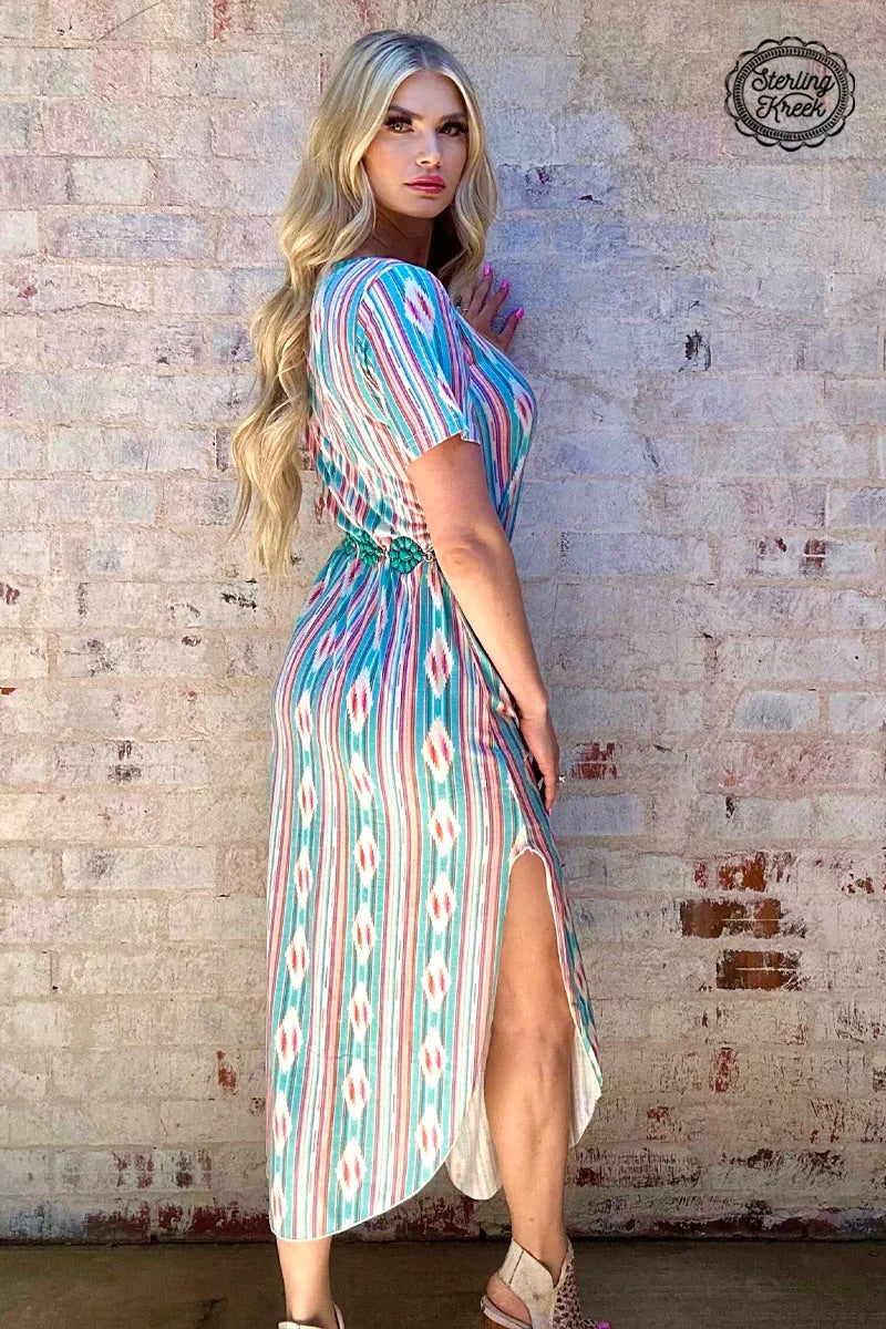 Feel like "Mamma Mia!" in this v-neck maxi dress! This faded beauty features a stylish serape/aztec print that'll have you singing "Dancing Queen" all night long. Get ready to turn heads with this showstopper!