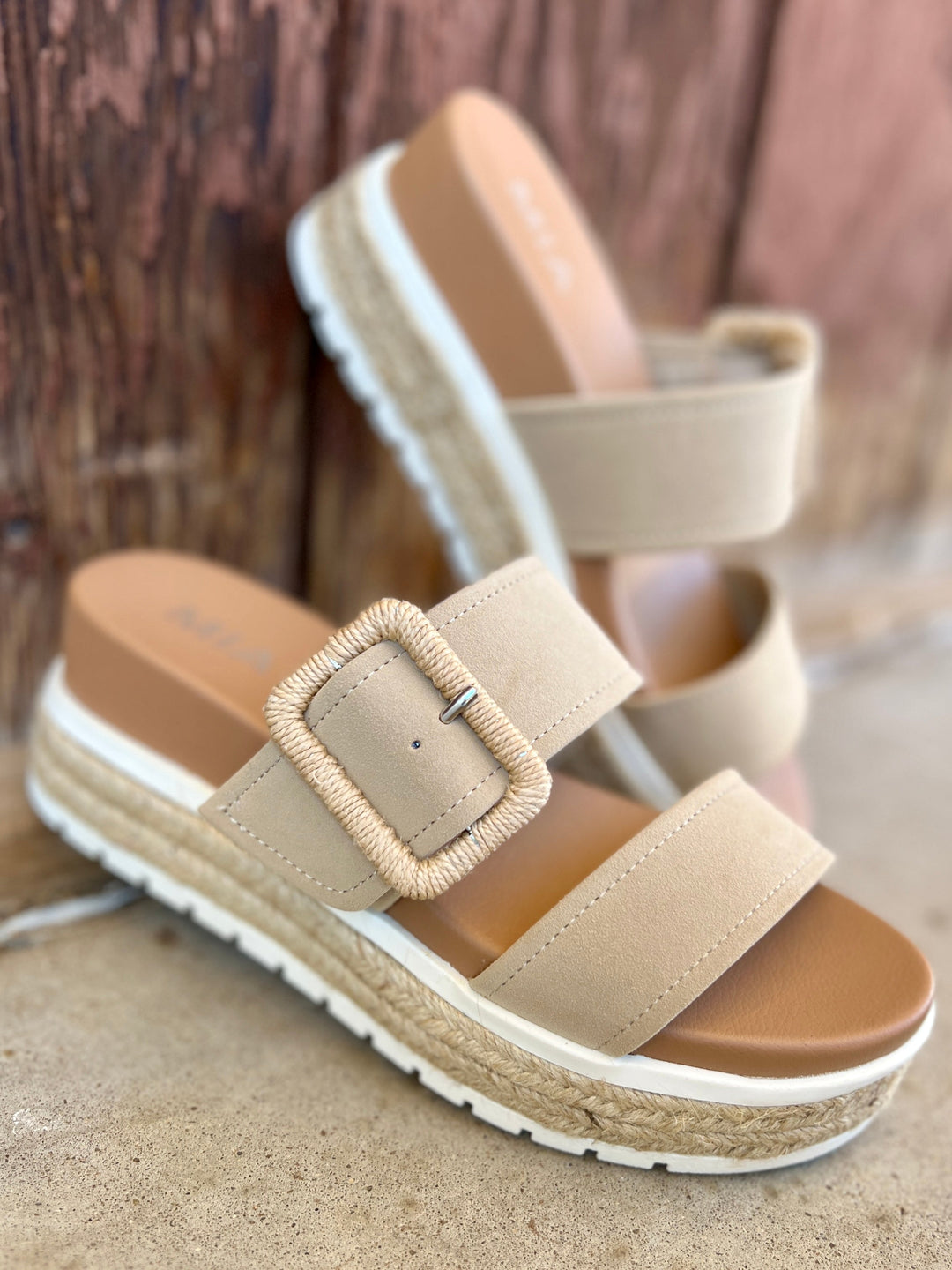 Suede Sand Raffia Platform Sandals | Gussied Up Online Suede sandal. Platform sandal. Neutral color sandal. Fashion trends. Women's shoes. Women's sandals. Women's style. Casual sandal. Women's casual footwear. Spring shoes. Summer shoes. Raffia sandals. Comfortable women's platform sandals. Style. Shoes. Fashion.
