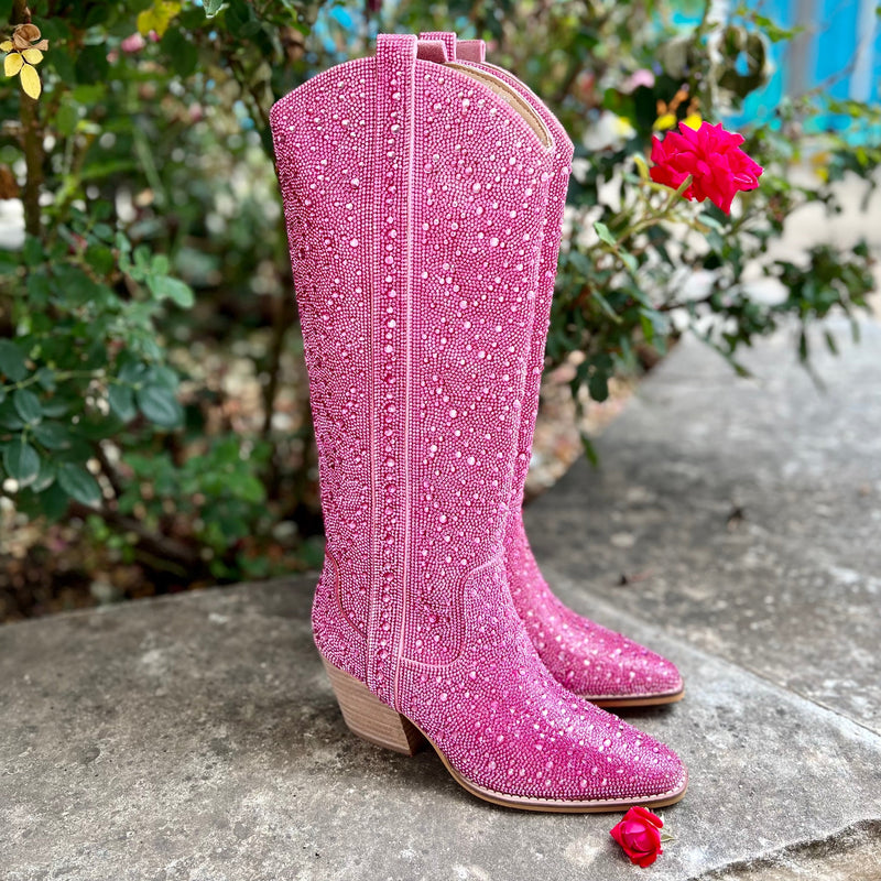 Add Glamour to any party with these Pink Rhinestone Boots with allover rhinestone detailing. Pointed Toe Silhouette, side zipper closure, 3" wooden block heel. These are one of the biggest trends in fashion right now, so grab yours and show off at every chance you get!  True to size
