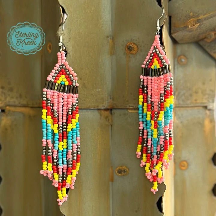 Sway into style with these Tiger Lily Seed Bead Earrings! These dangly delicacies are sure to take your look to the next level and have all your friends purring with envy!   LENGTH: 3.5"