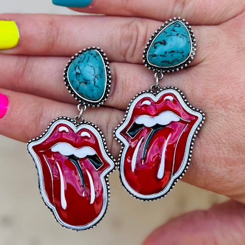 These exquisite Western Rolling Stone Tongue Earrings are the perfect accessory for any outfit. Crafted from turquoise post back studs, the 2" dangles feature a vibrant red tongue for a unique and eye-catching look. With unforgettable style and delicate elegance, these earrings will be sure to spark conversation.