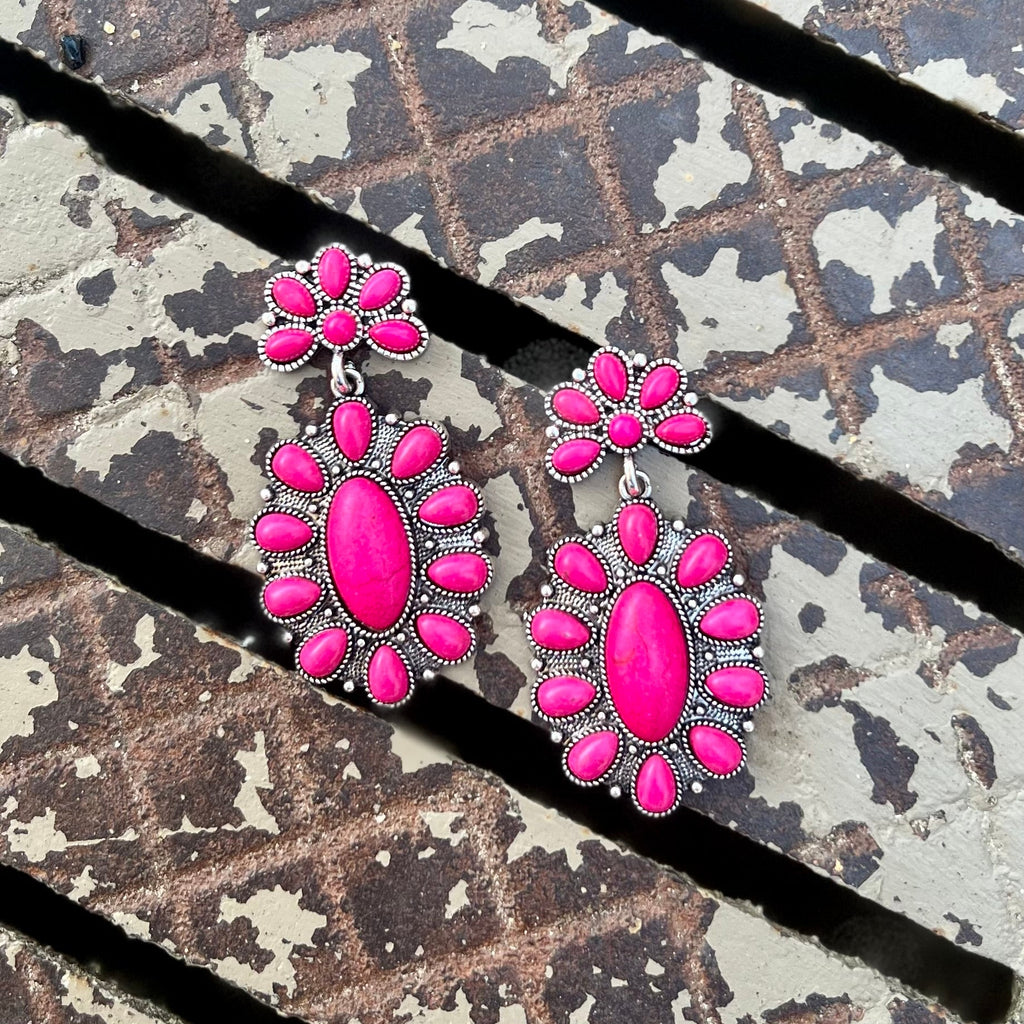 These Pink Blossoming Squash Earrings will propel you into a realm of timeless sophistication. The two-tier design, mini squash blossom and coupled with the soft luminosity of the pink stone, provides an exclusive touch of elegance. Perfect for any occasion, these earrings are sure to become a cherished addition to your wardrobe.