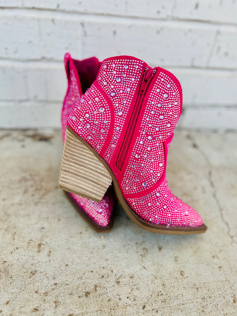 The Leg Up Pink Booties are your shortcut to style! With a 3" heel, pointed toe and pink rhinestone details, you'll strut in confidence and find your way through life with ease. Plus, the inside zipper means you won't find yourself endlessly searching for a way out. Look great, feel great! 8" in total height