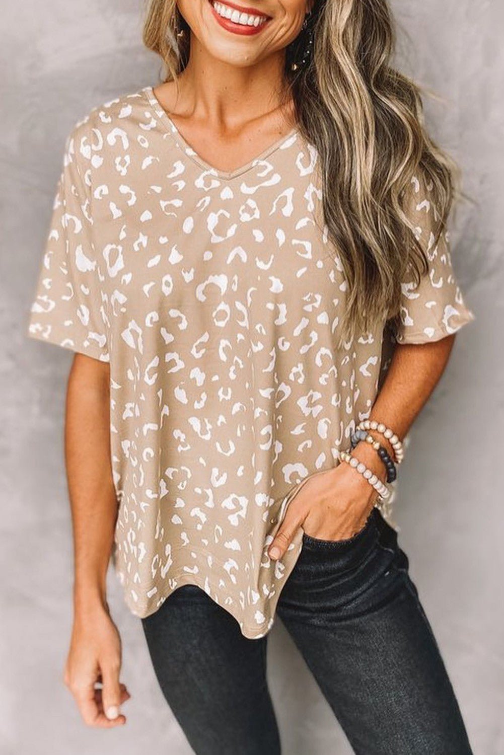 This "It's Spot On Top" is purrfect for adding some wild style to your wardrobe! Crafted from soft, lightweight fabric with a loose fit, the v neck and short sleeves make it comfortable and chic. The apricot leopard print adds a fierce twist - you won't want to miss out!