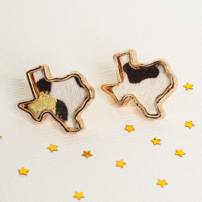 These Little Texas Earrings are perfect for adding an elegant, yet wild, flair to any look. The dainty, animal-print hair-on-hide post-back studs are available in four colors — brown and white, leopard print, leopard print and gold splatter, and black and white with gold splatter — and measure .75" in length. These stylish earrings will evoke a sense of sophistication and daring that can complete any ensemble.