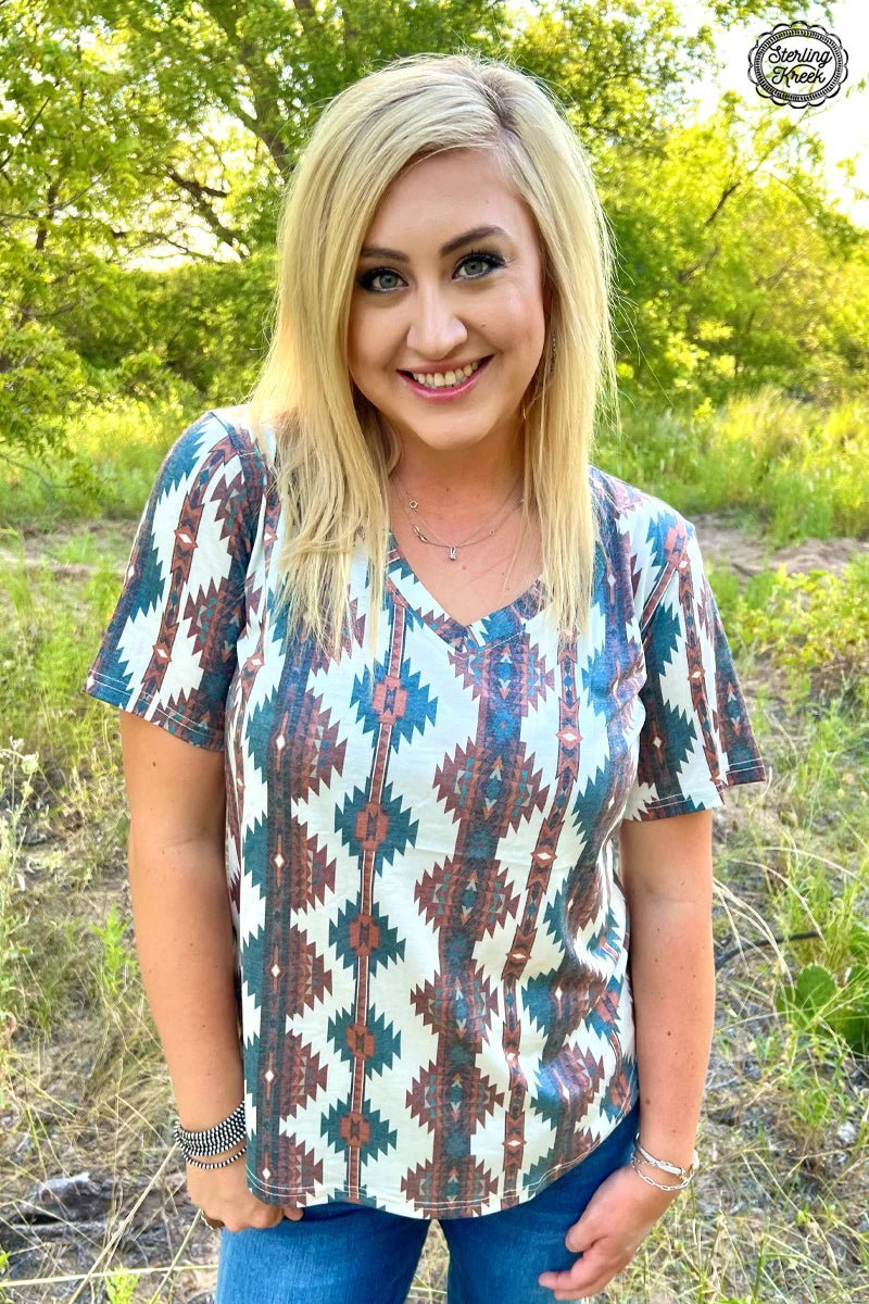 Be the life of the party in this Northern Valley Top! Eye-catching Aztec patterns in deep teal, browns, reds, and oranges make sure your style won't be missed. Perfect for outdoor gatherings that call for a little sophisticated flair! 🤩