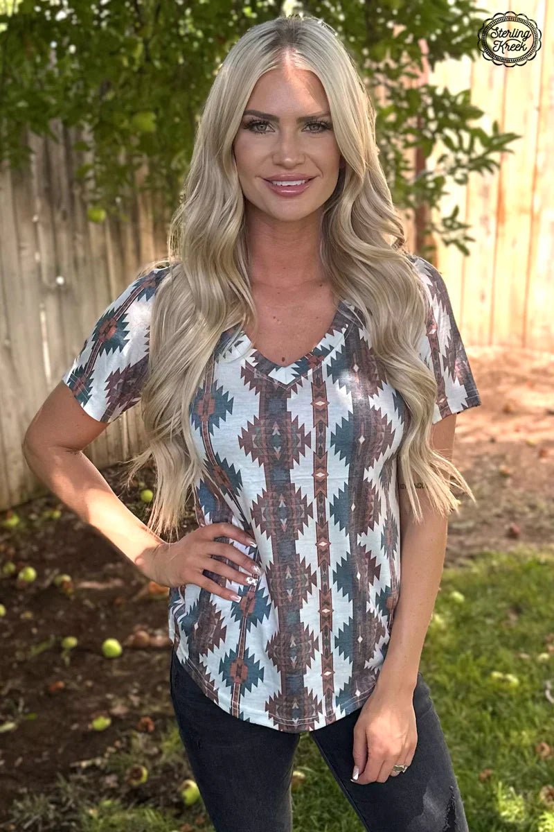 Be the life of the party in this Northern Valley Top! Eye-catching Aztec patterns in deep teal, browns, reds, and oranges make sure your style won't be missed. Perfect for outdoor gatherings that call for a little sophisticated flair! 🤩