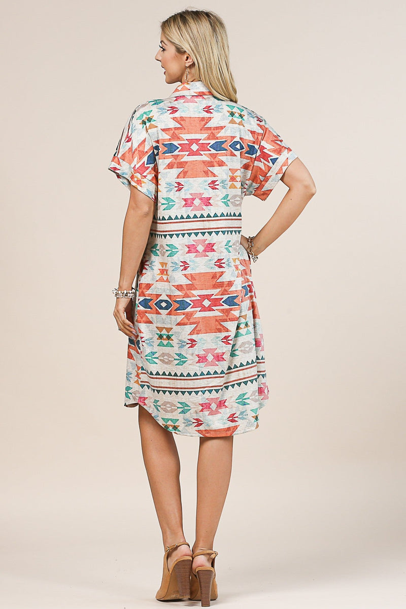 Introducing the Painted Goddess Button Down Dress, the perfect dress for days when you feel like letting your bohemian flag fly! With its relaxed fit, pockets, and beautiful aztec design, you'll find your confidence soaring. And the gorgeous colors? Trust us, you'll be radiant. Make a statement and look great doing it!  78% Polyester, 18% Rayon, 4% Spandex