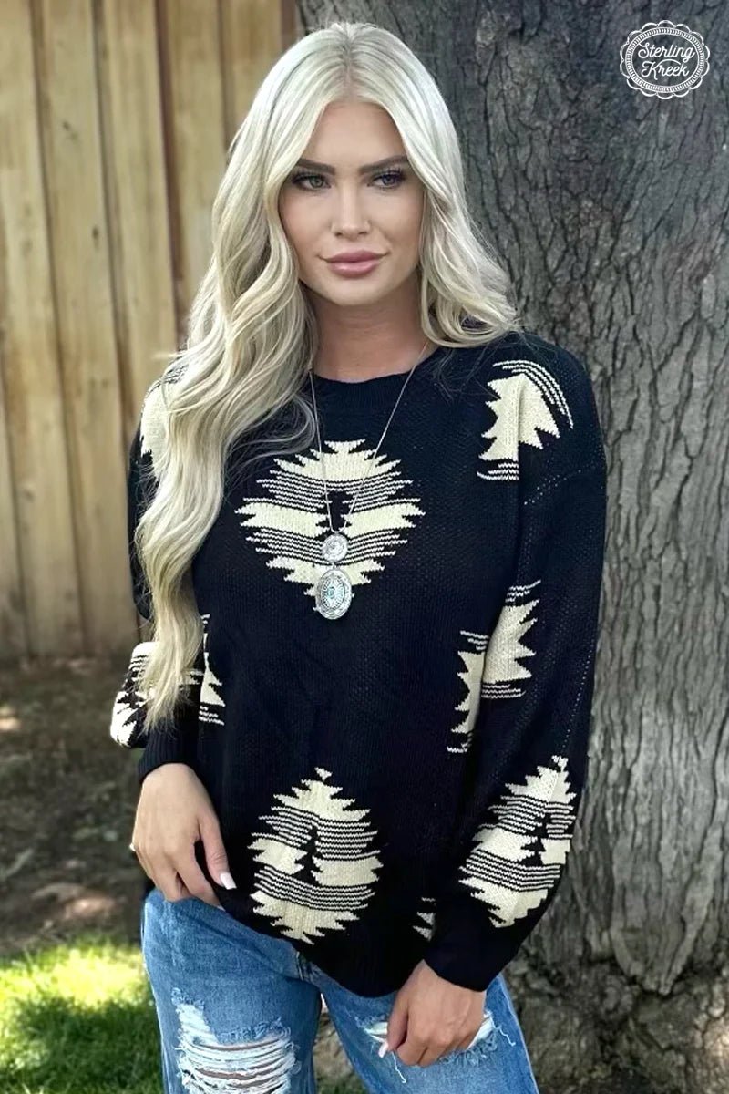 Stay cozy and add some flair with this Paint it Aztec Sweater! Its black fabric and bold cream Aztec design will have you feeling stylish, even when bundled up. So don't leave home without it!  100% ACRYLIC