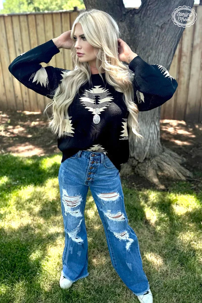 Stay cozy and add some flair with this Paint it Aztec Sweater! Its black fabric and bold cream Aztec design will have you feeling stylish, even when bundled up. So don't leave home without it!  100% ACRYLIC