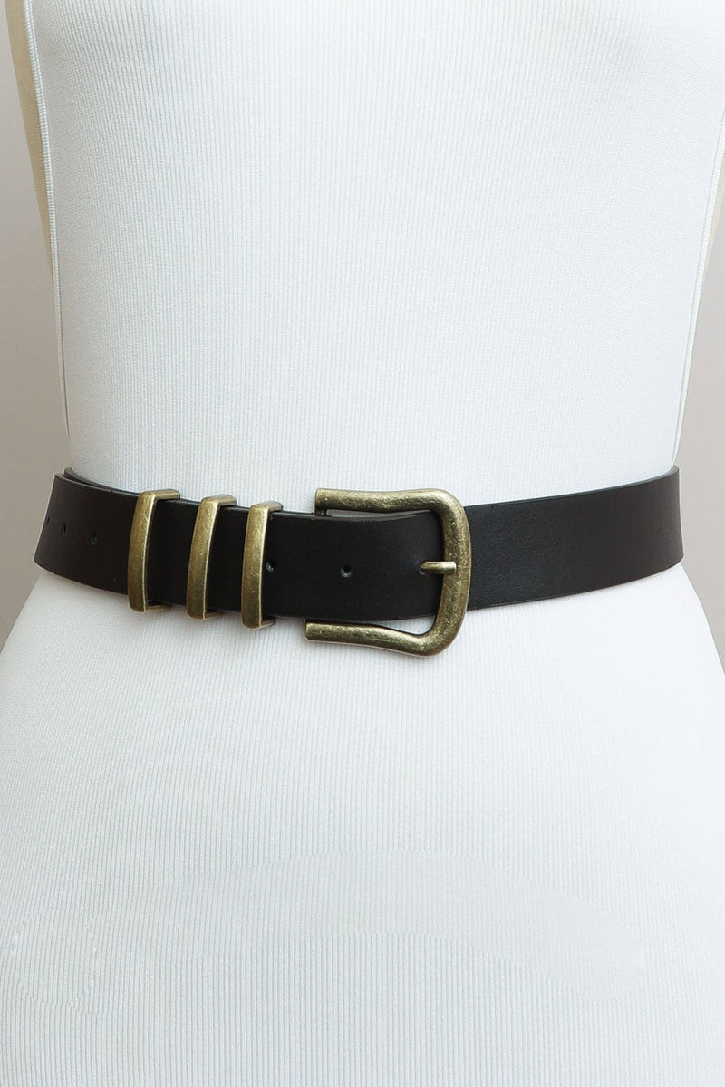 Gleaming vegan leather infuses classic style into this timeless accessory. The Three Simple Things Belt is a subtle yet refined statement piece, complementing any look. Crafted with impeccable attention to detail, this 42" X 1.5" belt offers sophistication and finesse.