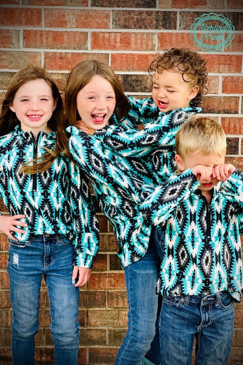 Climb to stylish heights in this cozy Mini Aztec Everest Pullover! It comes in a black, turquoise, and white aztec pattern that’ll look great in whatever adventure life takes you. Conquer the fashion mountain with this one-of-a-kind pullover!  32% COTTON 56% RAYON 12% SPANDEX