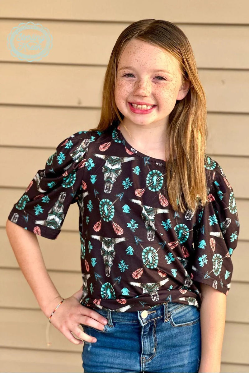 Rock any western style look with this awesome Western Tribal Top: black material with eye-catching cowskull and turquoise conchos with arrows. It's an edgy way to show off your sense of fashion without saying a word! (Yee-haw!)  94% POLYESTER 6% SPANDEX