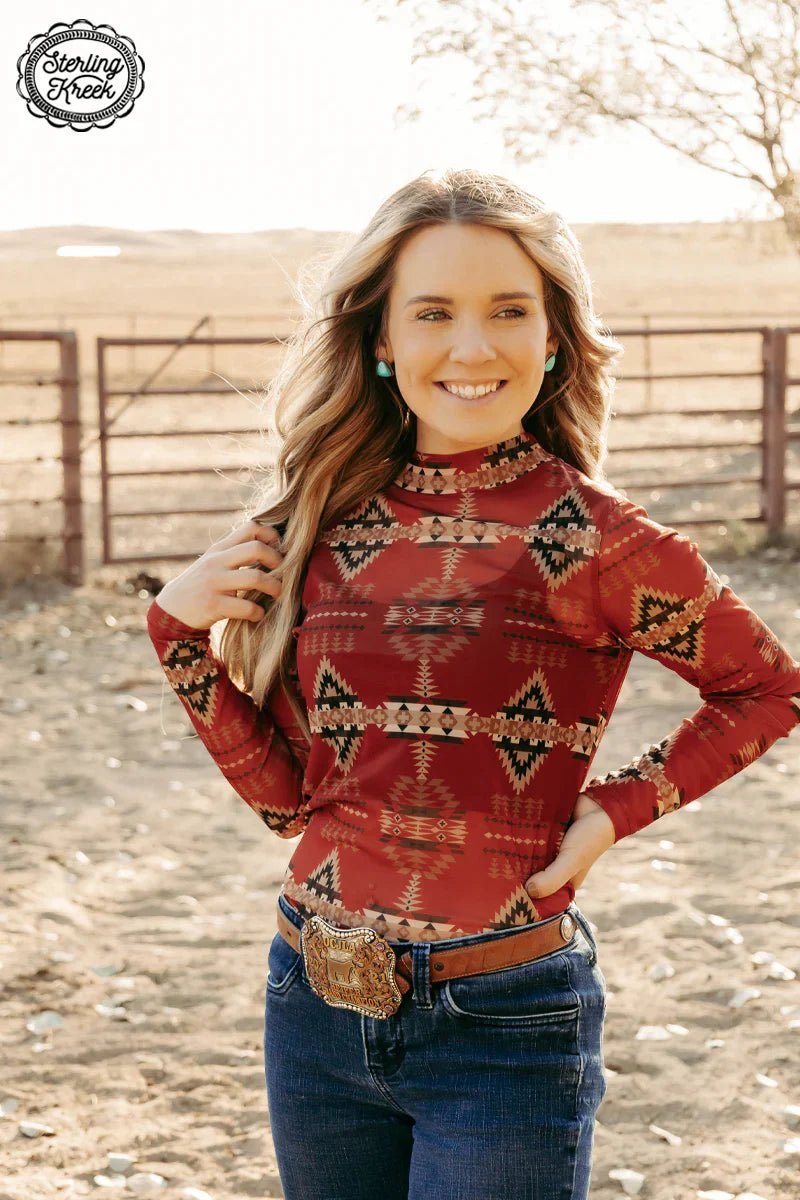 It's time to get modern meets traditional in your wardrobe! Our Aztec To The World Top features a beautiful bold red mesh top with a colorful and intricate aztec pattern that'll make you a total knockout. So yeehaw and get your hands on this one-of-a-kind piece that's sure to turn heads!   96% POLYESTER 4% SPANDEX