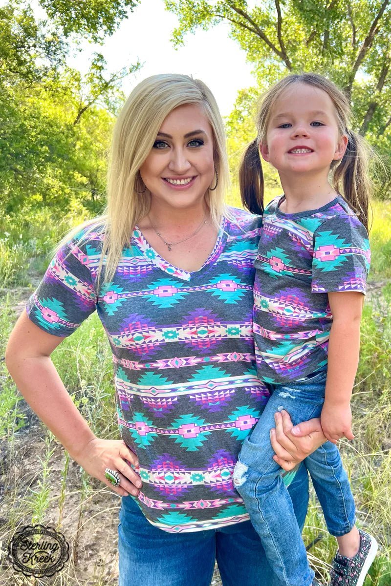 Be the life of the party in this Aztec Horizon Top! Eye-catching Aztec patterns in turquoise, purple, pink, and vintage black make sure your style won't be missed. Perfect for outdoor gatherings that call for a little sophisticated flair! 🤩