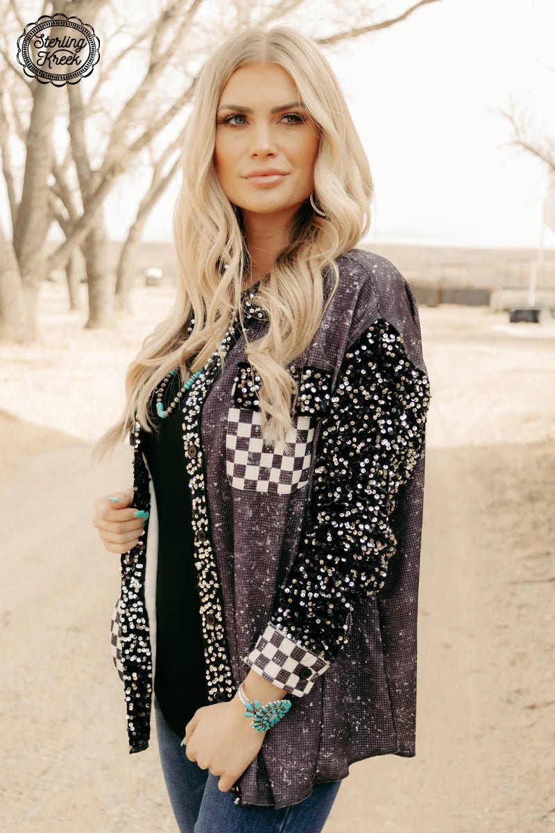 Checker print shacket. Glitter shacket. Black and white checker shacket. Sparkle shacket. Long sleeve button up shacket. Women's western wear. Women's western boutique. Women's trending fashion. Online boutique. Small business. 
