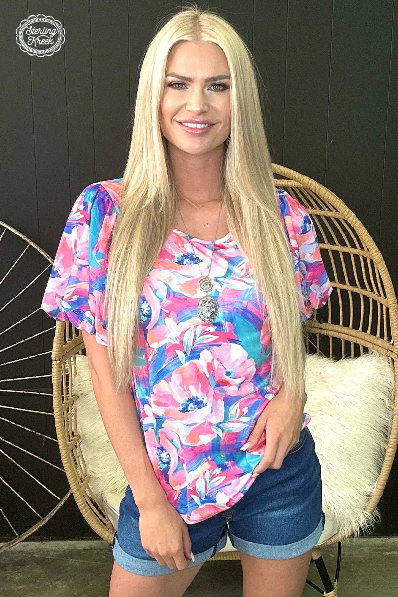 Look blooming beautiful in the PLUS Bloomin' Boss Top! Featuring a floral print and mesh bubble sleeves, this unique top is sure to have heads turning your way. Show off your bright style with this flirty and fun look!  50% POLYESTER 45% COTTON 5% SPANDEX
