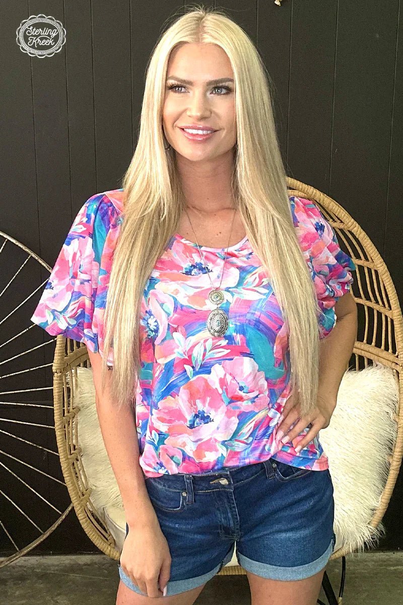 Look blooming beautiful in the PLUS Bloomin' Boss Top! Featuring a floral print and mesh bubble sleeves, this unique top is sure to have heads turning your way. Show off your bright style with this flirty and fun look!  50% POLYESTER 45% COTTON 5% SPANDEX