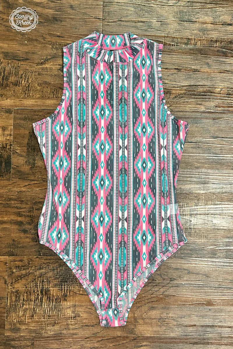 Be ready to rock any outdoor event with our Happy Days Bodysuit! The special aztec mesh fabric keeps you cool while you dance the night away. A unique, stylish, and comfortable way to make your mark. 🔥