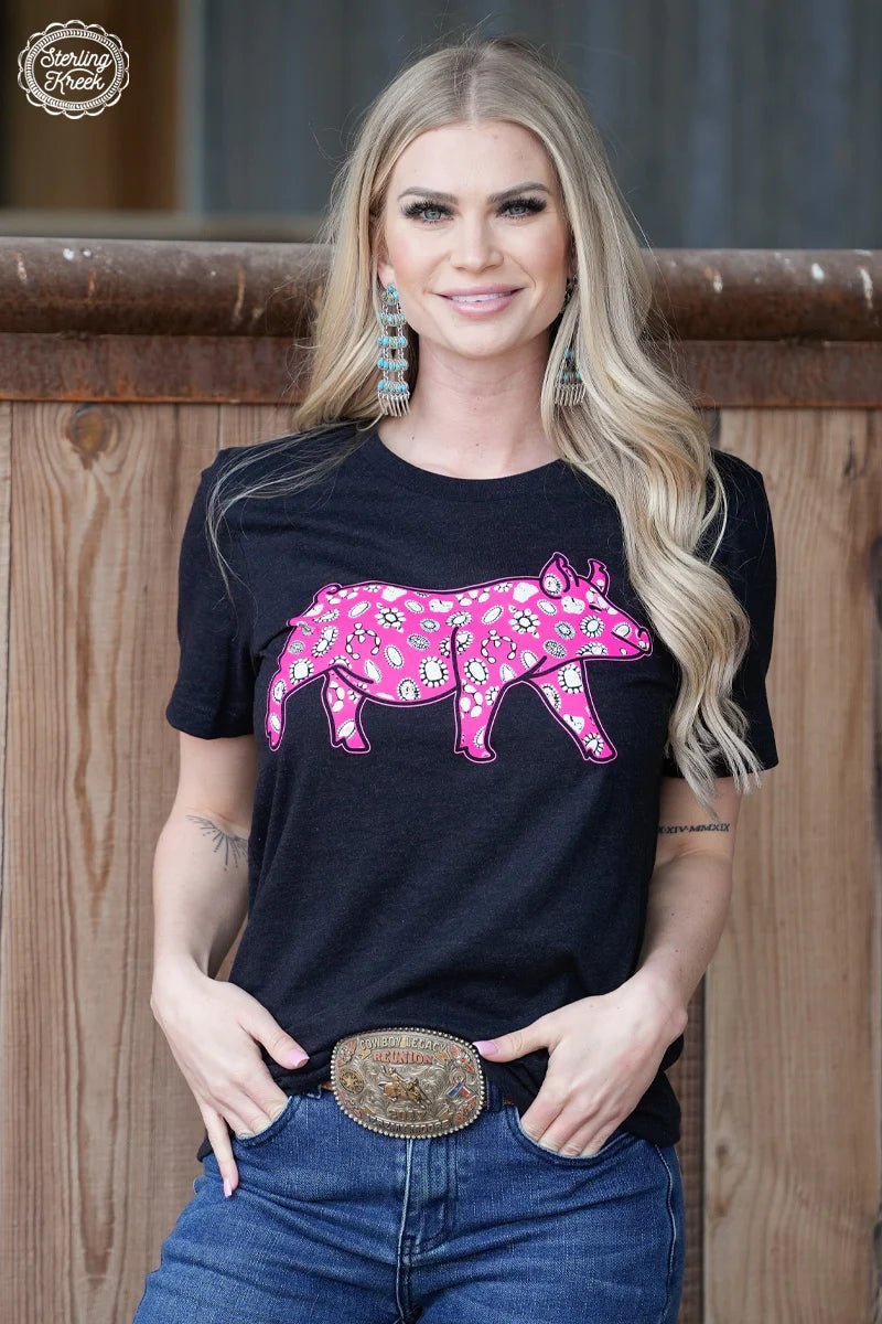 Sterling Kreek Tee. Graphic tee. Stock show shirt. Pink pig shirt. Pig shirt. Western style tee. Black tee shirt. Boutique style. Women's western wear. Women's western boutique. Western boutique. Online shopping. Online boutique. Boutique. Small business. Woman Owned. 