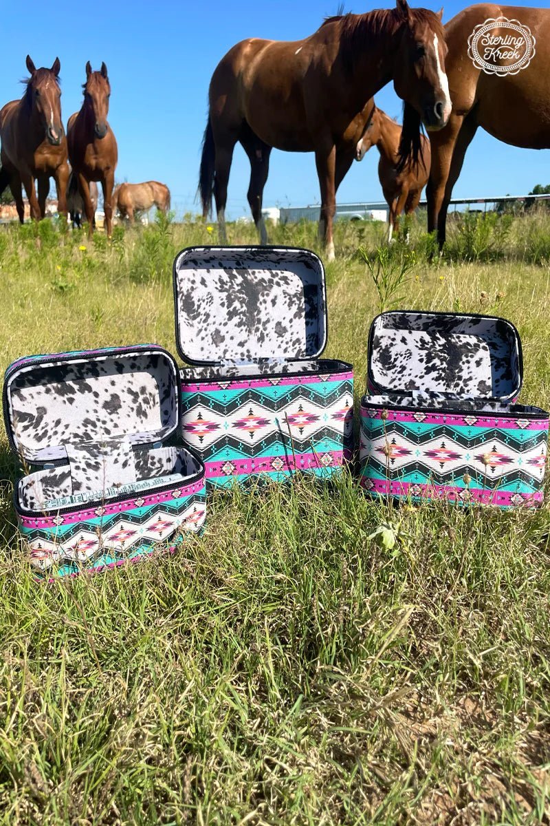 Set of 3 NESTING boxes.   Our cow-ztec Beauty Boxes are sure to get you moo-ving! With three sizes to choose from and featuring a bright and bovine-ful cow print on the inside and a pink and turquoise aztec pattern on the outside, these boxes make for a trend-setting beauty storage solution that makes a moo-d statement.  Small : L 7.25" X W 4" X H 4"  Medium : L 8.25" X W 5" X H 5"  Large : L 9.25" X W 6" X H 6.75"