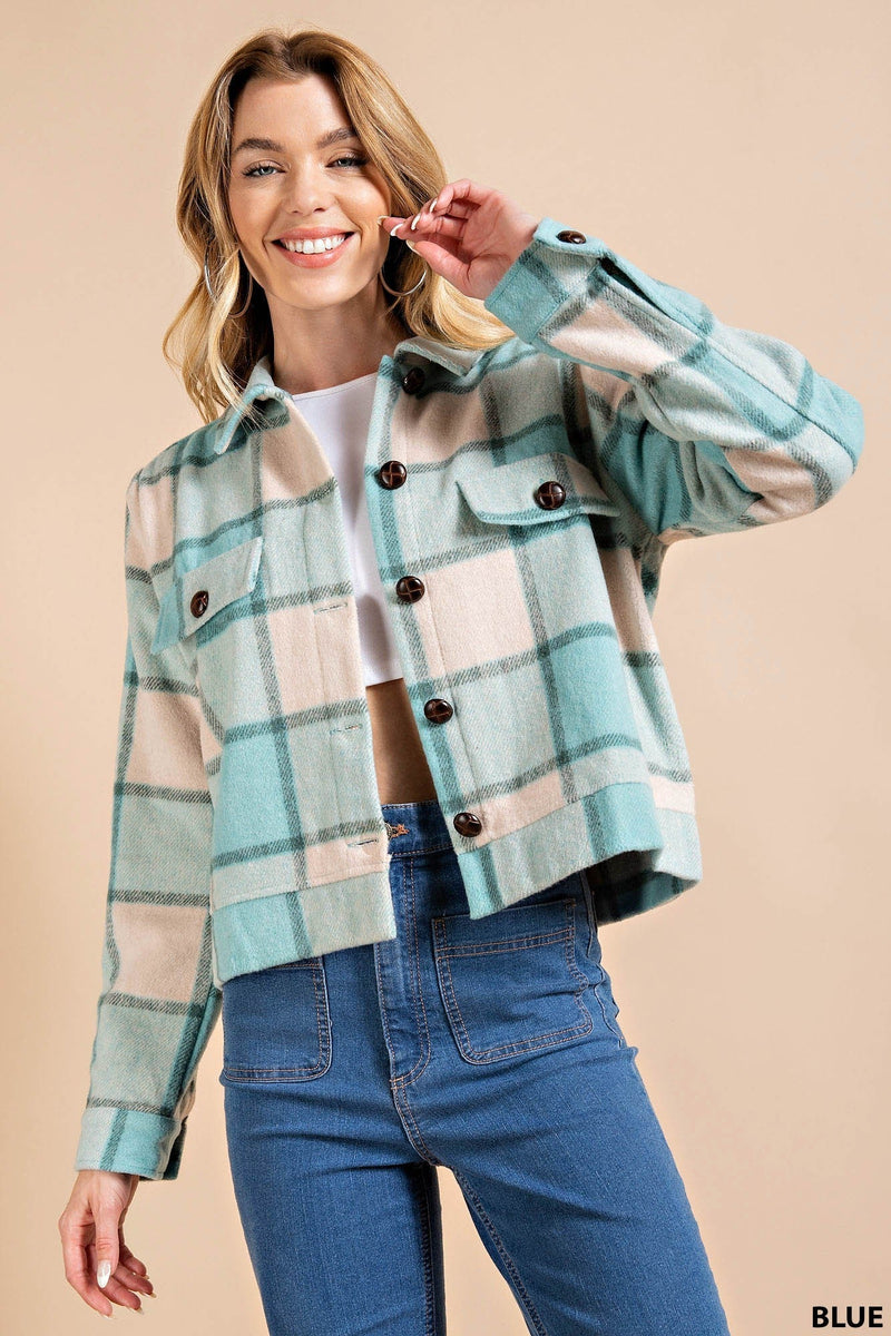Slip into this fun and fashionable Blue Kori America Plaid Jacket! With its unique blue plaid, standout spread collar, and flap pocket, this jacket is perfect for making a style statement. Button up and show your plaid pride!
