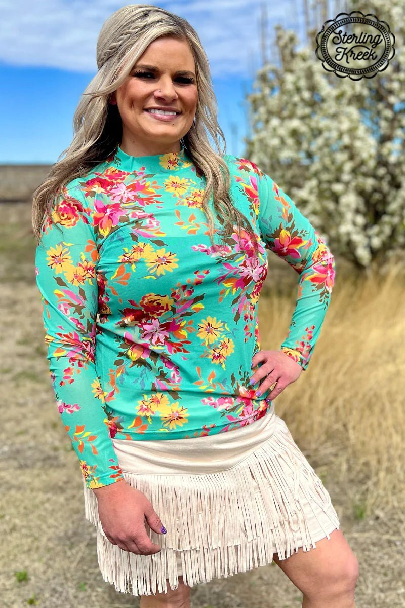 Sterling Kreek FLoral Queen Mesh Top| Gussied Up Online  https://www.gussieduponline.com/products/floral-queen-mesh-top  Sterling Kreek Floral Queen Mesh Top. Floral sheer top. Western style mesh top. Rodeo top. Floral turquoise mesh top. Bright Floral Sheer top. Women's sheer tops. Layering tops. Western fashion. Fashion Trends 2024. Black mesh top. Turquoise. Western outfit. Easter outfit. Western boutique. Small business. Woman Owned.