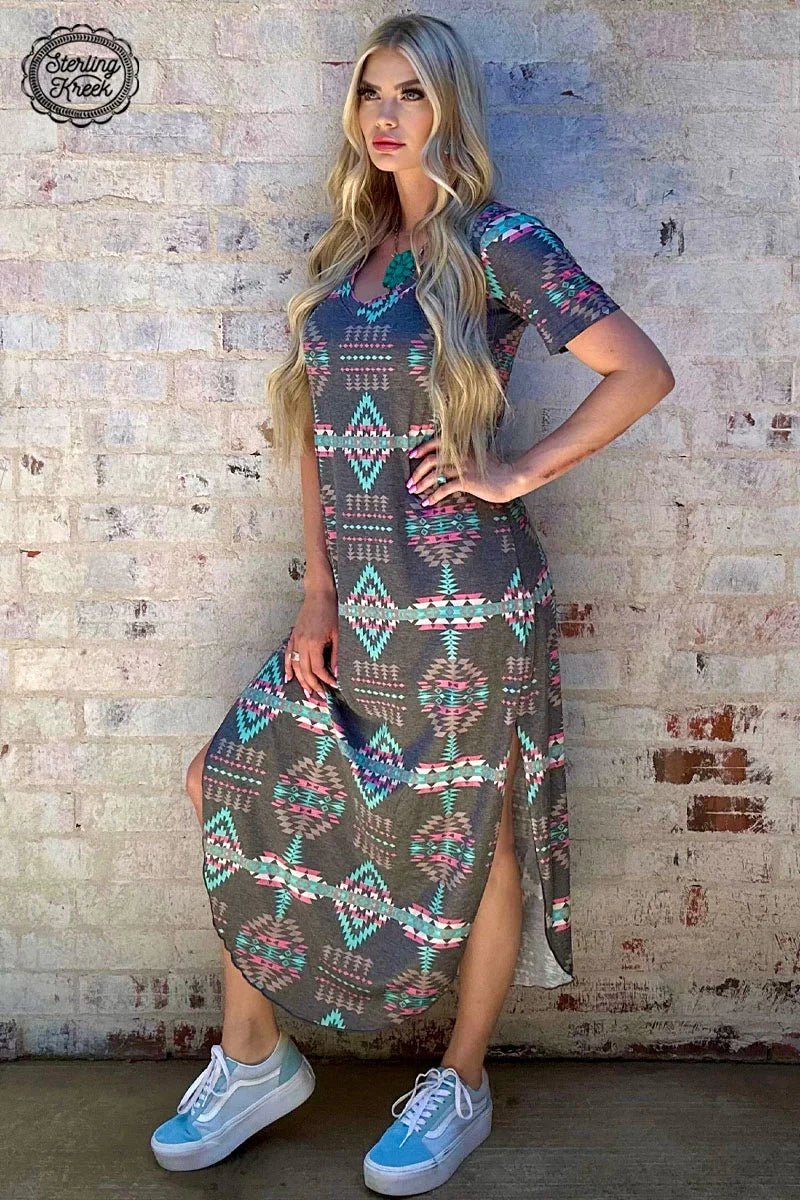 Gray aztec print maxi dress. Pink and turquoise aztec print dress. Long v-neck side slit dress. Western boutique. Women's western wear. Online boutique. Small business. Western fashion. 