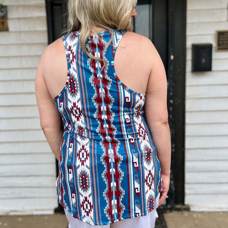 This STREETS OF LAREDO Tank is sure to be the centerpiece of your wardrobe! With a vibrant red, cream and blue Aztec print, you'll be stepping out in style and turning heads. Perfect for any occasion that calls for a little extra flare, this eye-catching tank is guaranteed to be the talk of the town!  50% POLYESTER 45% COTTON 5% SPANDEX