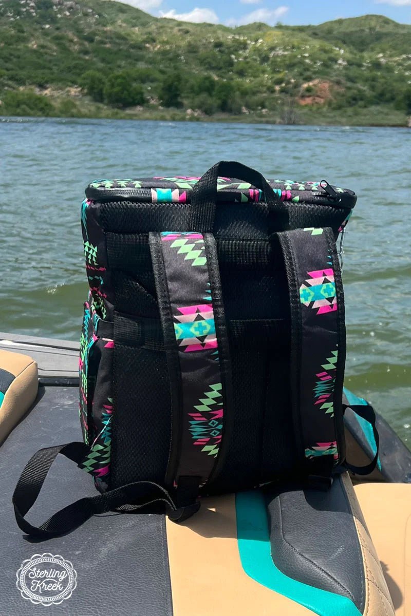 Cool off with this Northern Lights Cooler Backpack - stylishly designed with a bold black background and bright accents of purple, lime green and turquoise! It's the perfect way to keep your favorite beverages frosty and your hands free - so chill out and show off your awesome taste in backpacks!  15X11X7.5