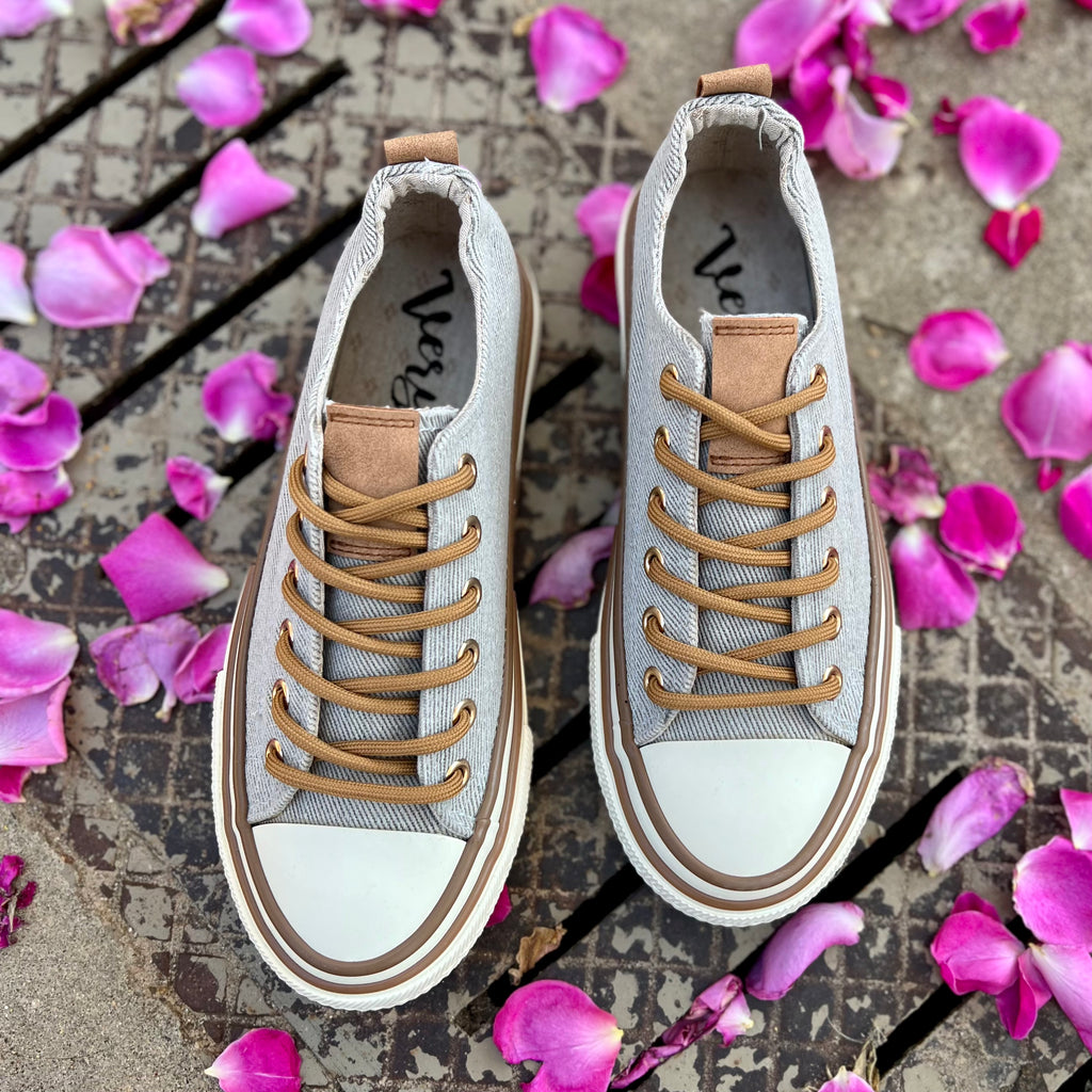 These sneakers are not only cute and stylish, but the comfy as all get out! The super cushioned foot bed offers optimal comfort. Ideal for everyday wear. The rubber sole ensures stability with every step. The upper shoe is a grey color and is a canvas like material. 