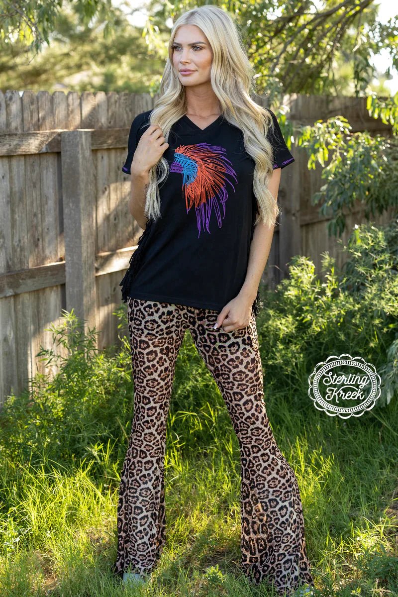 Style your way into the wild with our Meshed Up Bells - Leopard! Make a statement with the vibrant leopard mesh and black shorts underneath. These bells are sure to turn heads! Make your move and unleash your unique style!  94% polyester 6% spandex
