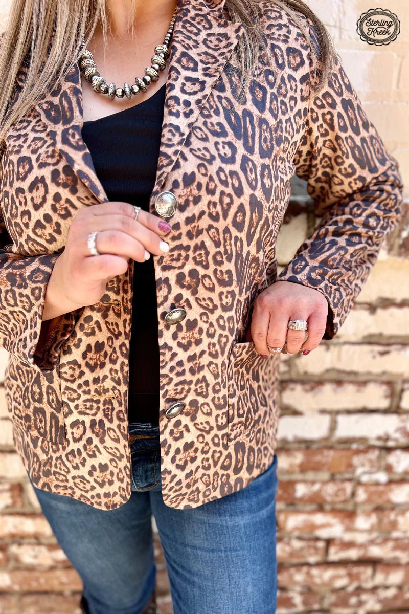 tsstThis sophisticated-meets-sassy PLUS Loveland Kitty Blazer offers all the chic style you need with an extra dose of wild! Making a statement with its cheetah print, it also features two pockets plus a style upgrade with buffalo nickel buttons. Meow!  Syleste is wearing an XL  90% POLYESTER 10%SPANDEX