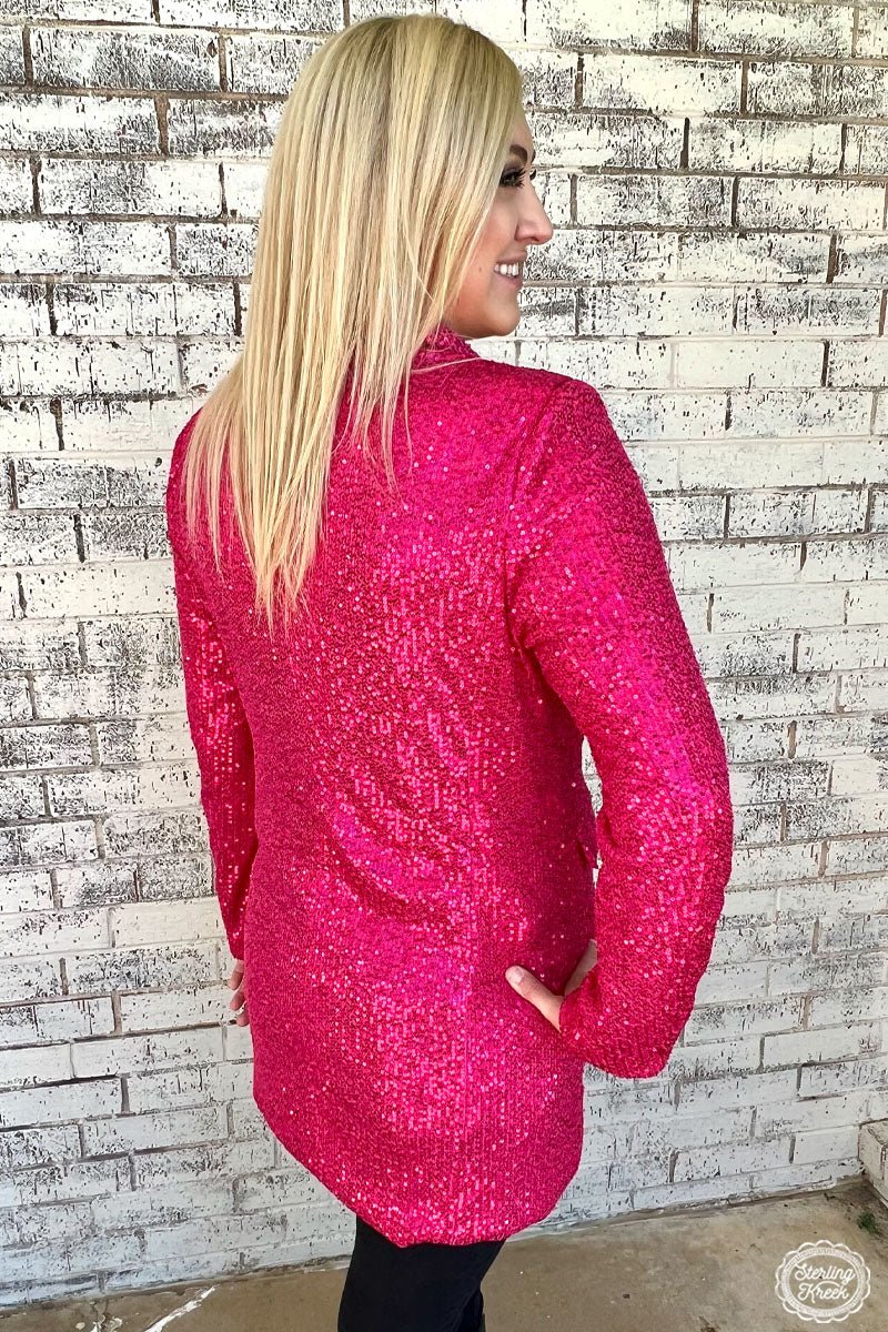Bling up any look with our BLINGIN' BLAZER PINK! This pink sequin blazer will be the star of your wardrobe, sure to get you noticed wherever you go. Don't be surprised by the compliments coming your way - you're gonna be sparklin'!  Lining: 100% polyester  95% polyester 5% spandex