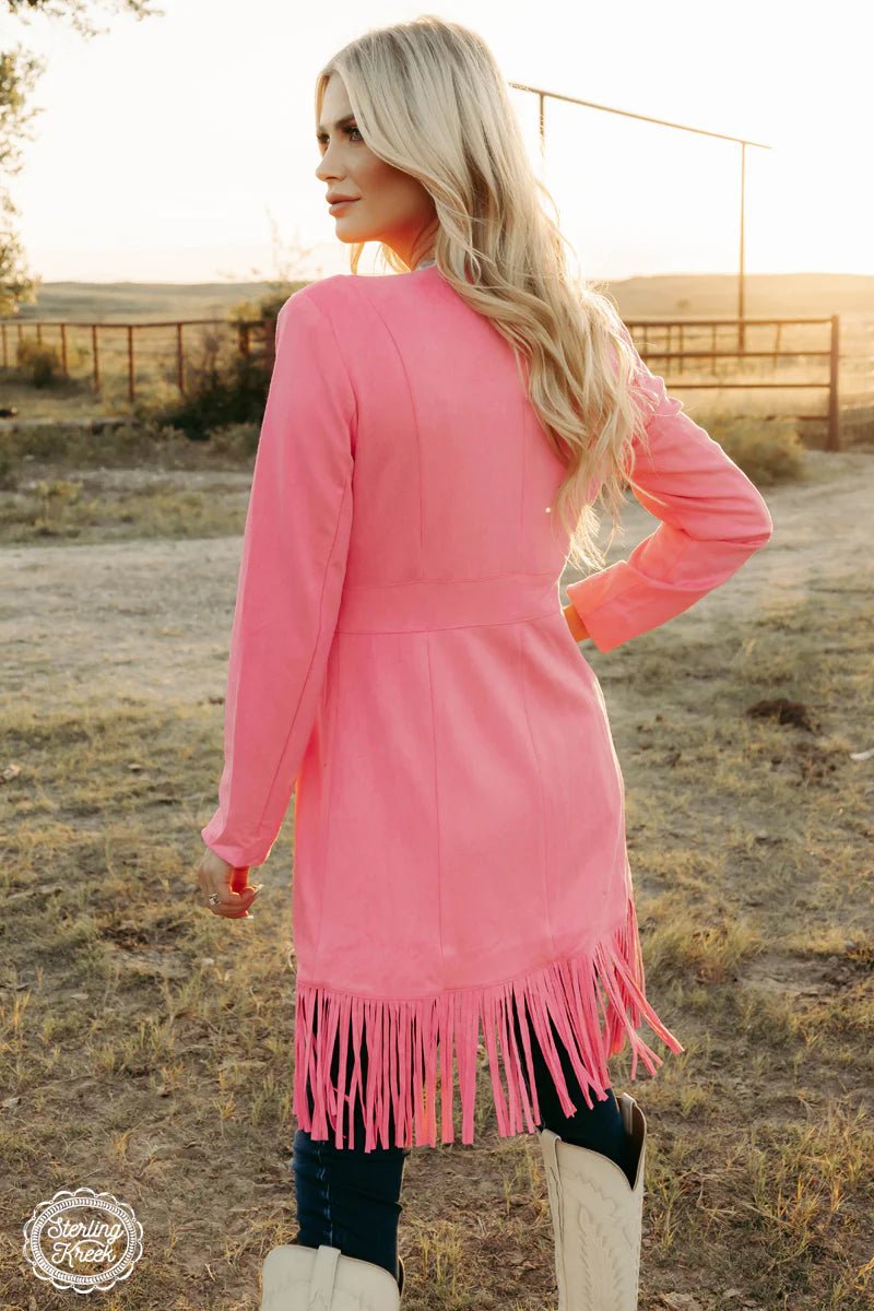 Look wild and stylish with this Scottsdale Suede Jacket! With a bold pink color, standout fringe, and a concho lining to sweeten the deal, you'll be the envy of any room you enter! Not to mention, the suede material guarantees a soft, comfortable fit all night long. Get ready to rock this statement jacket, nothin' else will do!  SHELL : 92% POLYESTER LINING: 100% POLYESETER