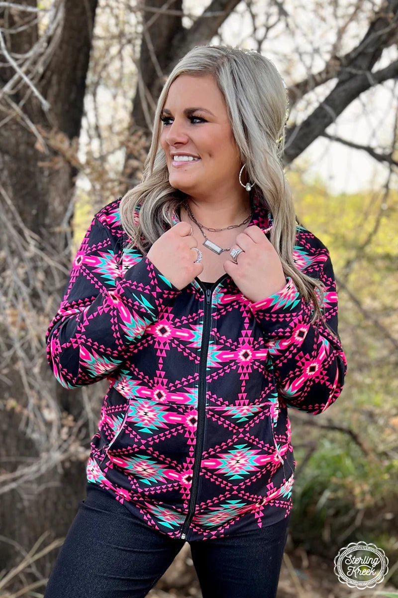A jacket that won't hold you back - this No Limits Jacket! With its eye-catching pink, black, and turquoise aztec pattern, this zip-up has got both the style and the action to keep you looking and feeling fabulous!  32% Cotton 56% Raydon 12% Spandex