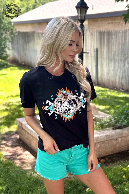 This PUMPKIN PICKIN' TEE is the perfect pick for pumpkin-lovers! Crafted with a black and white cowhide pattern, the tee features an aztec outline that stands out and lets you show off your stylish side. Now that's one pick-o-lantern you won't wanna pass up!  90%cotton 10% polyester 