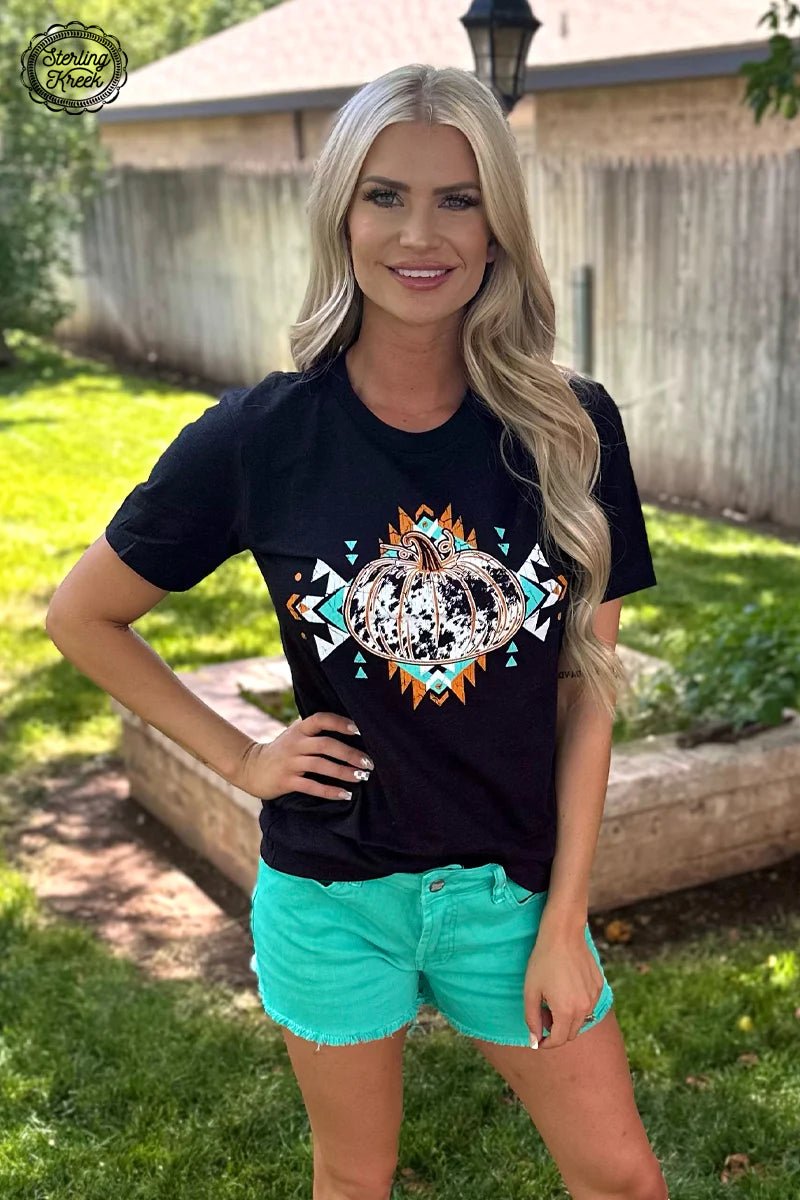 This PUMPKIN PICKIN' TEE is the perfect pick for pumpkin-lovers! Crafted with a black and white cowhide pattern, the tee features an aztec outline that stands out and lets you show off your stylish side. Now that's one pick-o-lantern you won't wanna pass up!  90%cotton 10% polyester 