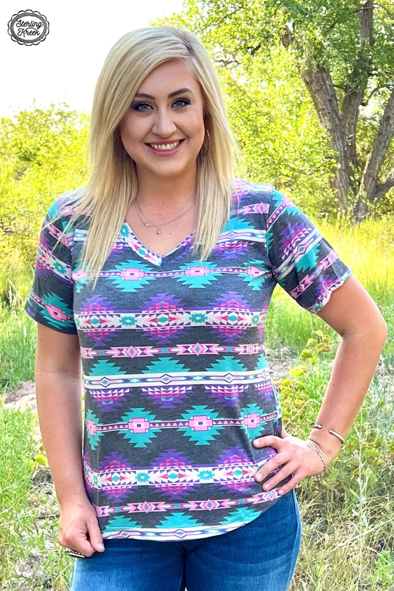 Be the life of the party in this PLUS Aztec Horizon Top! Eye-catching Aztec patterns in turquoise, purple, pink, and vintage black make sure your style won't be missed. Perfect for outdoor gatherings that call for a little sophisticated flair! 🤩     55% cotton 40% polyester 5% spandex   Measurements are with shirt laid flat 