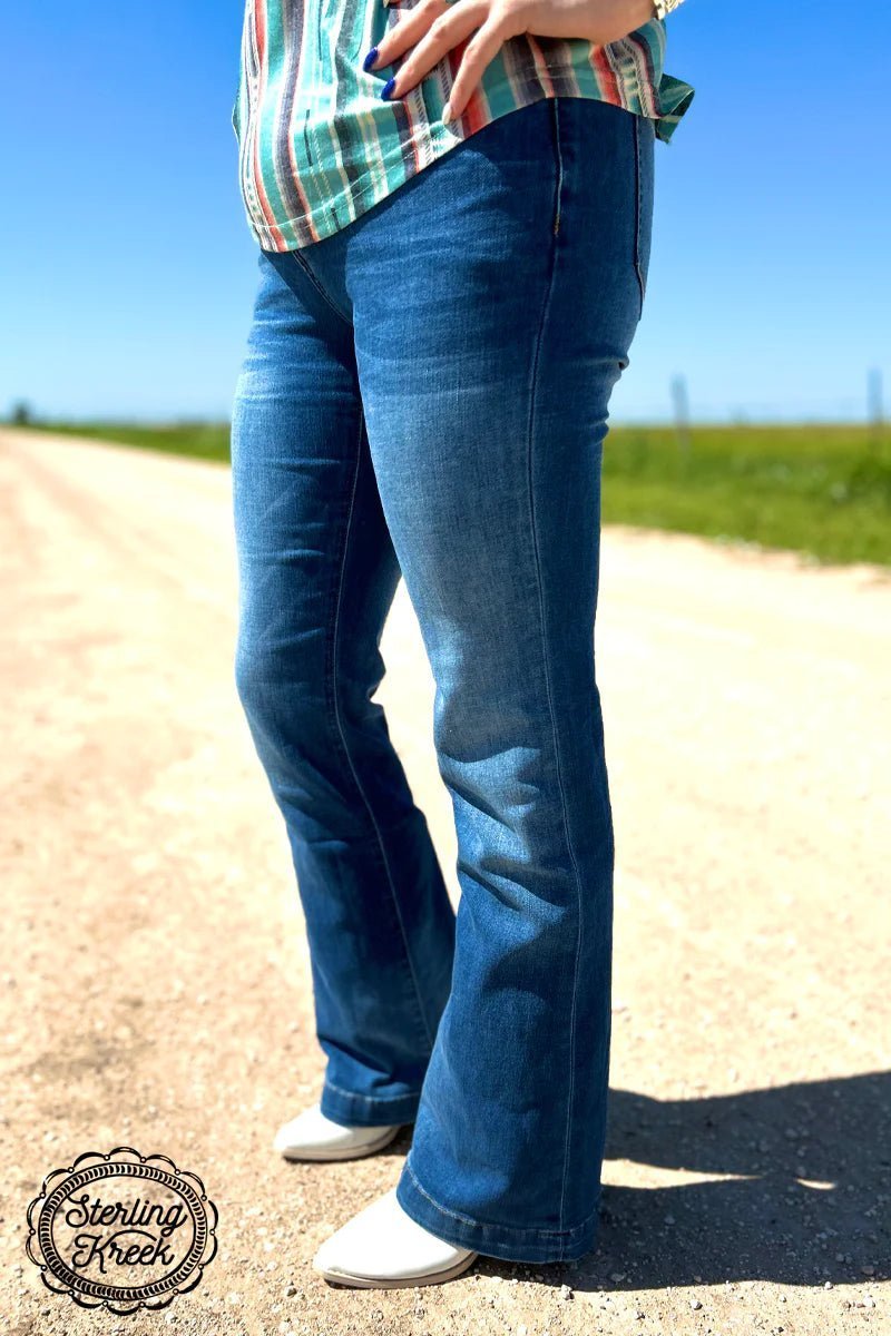 Medium wash regular length jean. Regular inseam bootcut jean. Medium wash denim jeans. Women's western fashion. Women's western boutique. Online boutique. Small business. Western apparel. 