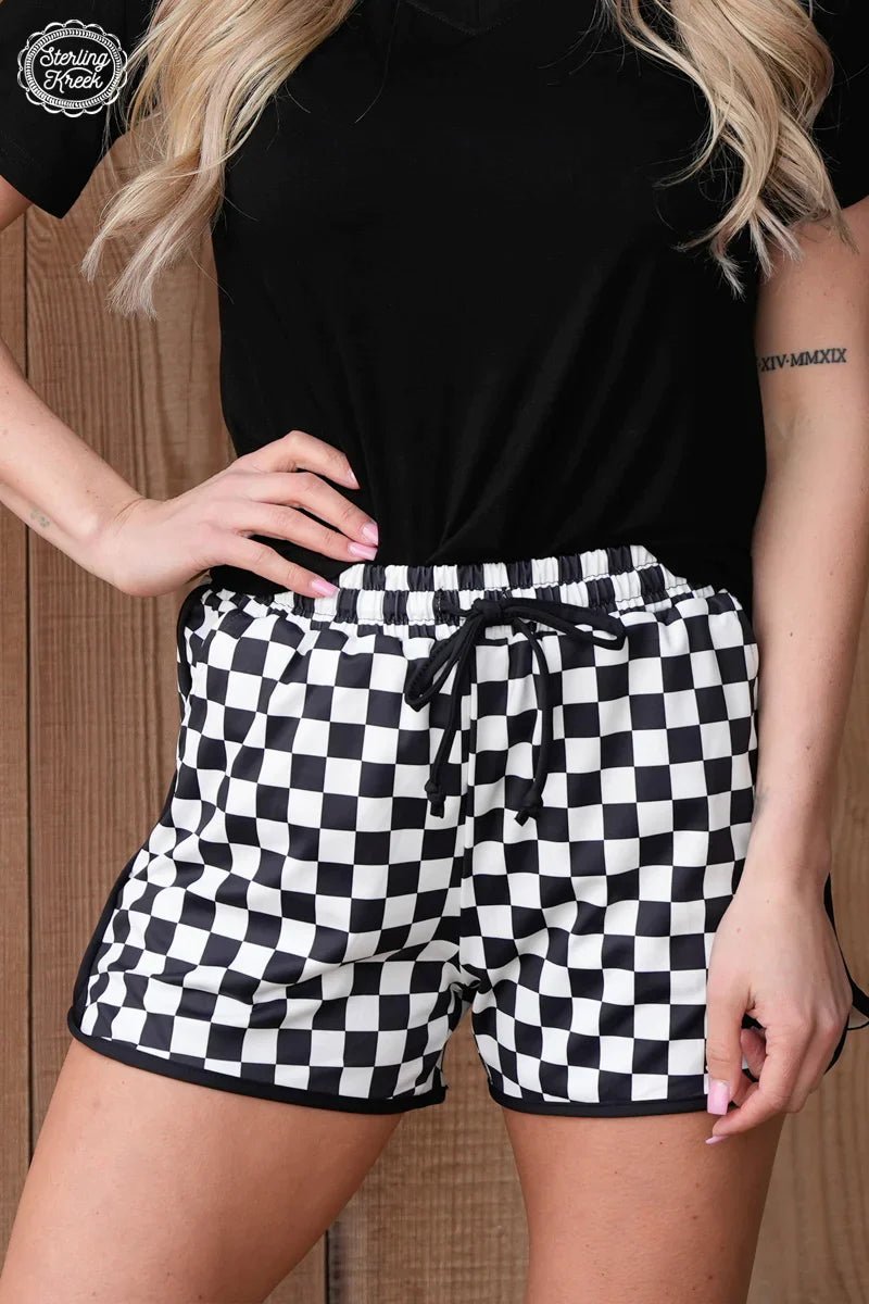 Sterling Kreek Shorts. Black and white checkered shorts. Athletic shorts. Work out shorts. Comfy shorts. Black shorts. Trendy shorts. Boutique style. Online boutique. Western boutique. Boutique. Small Business. Woman Owned. 