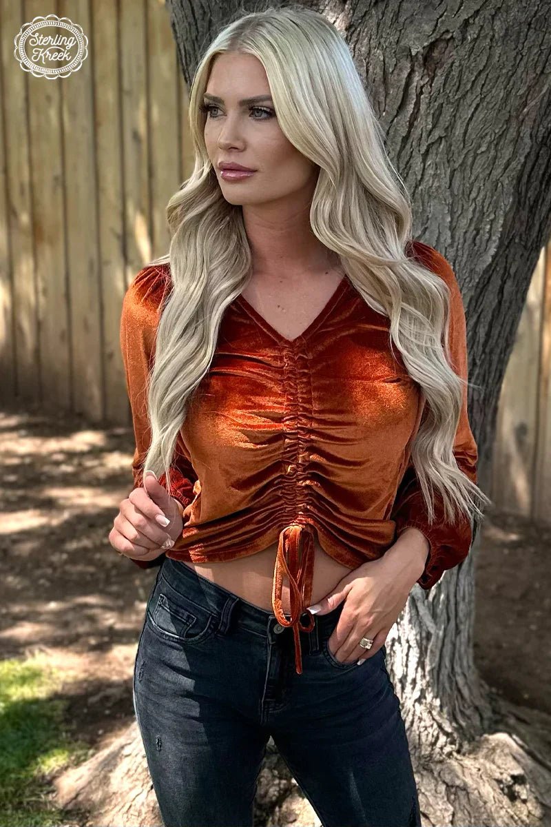 Make waves with our Texas Twist Rustic Top! This velvet, orange top will have heads turning with its unique design--and you can choose whether you want it long or cropped to show off your rebel side! Style and comfort? Perfect combo  5% spandex 95% polyester
