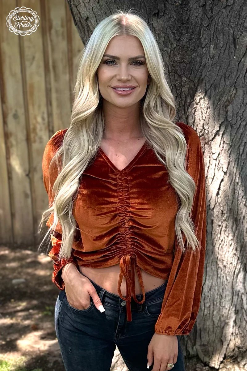 Make waves with our Texas Twist Rustic Top! This velvet, orange top will have heads turning with its unique design--and you can choose whether you want it long or cropped to show off your rebel side! Style and comfort? Perfect combo  5% spandex 95% polyester